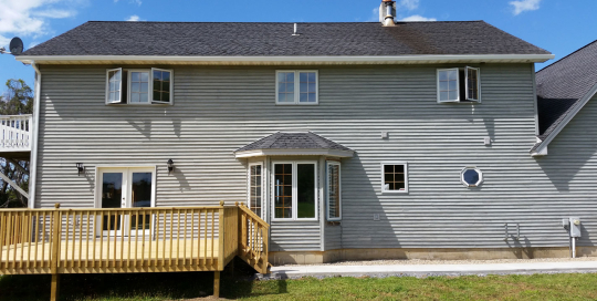 2nd floor gutter and downspout through deck