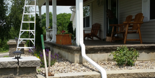 Downspout past landscaping